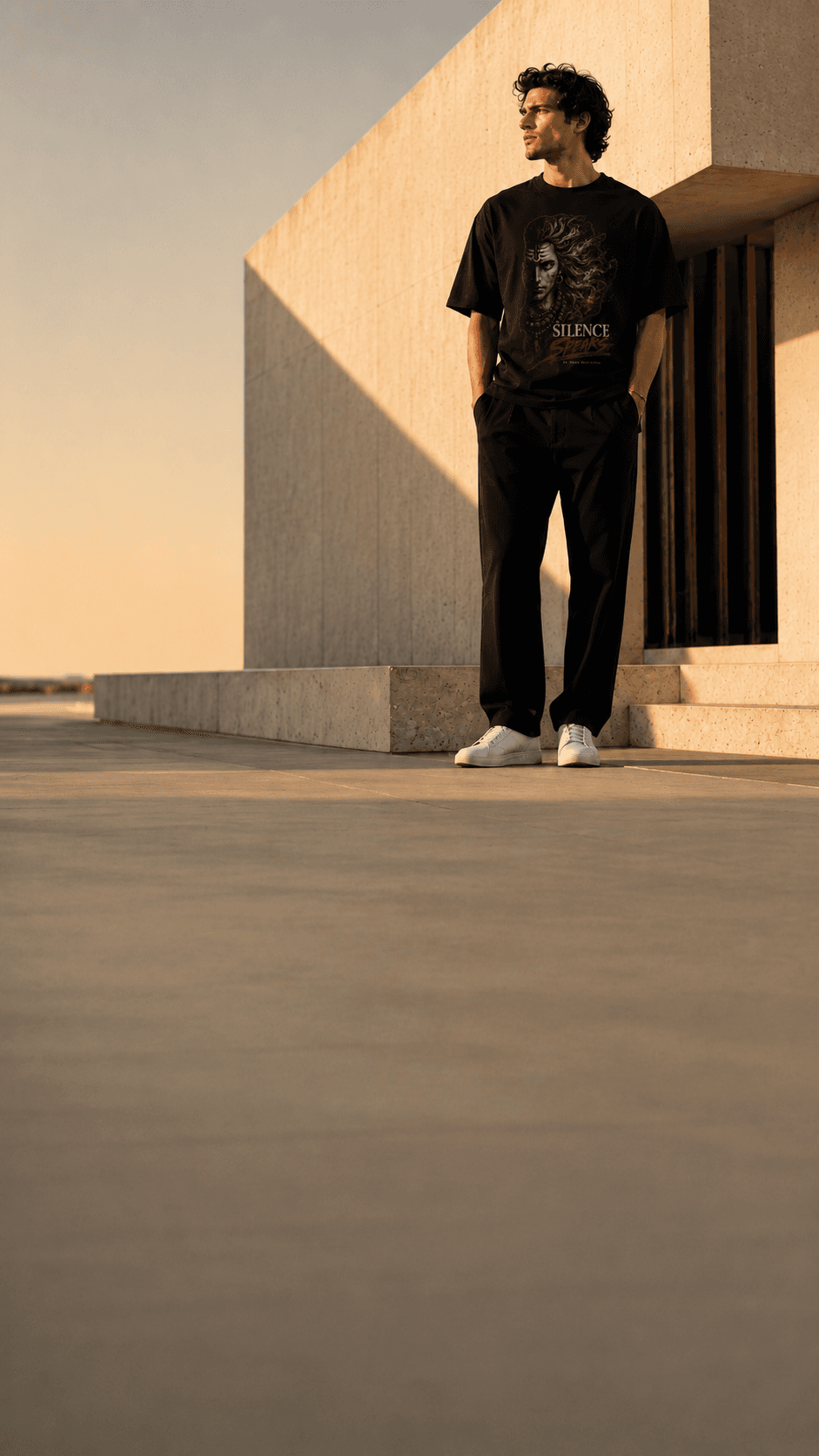 Silence Speaks oversized tee in warm architectural light